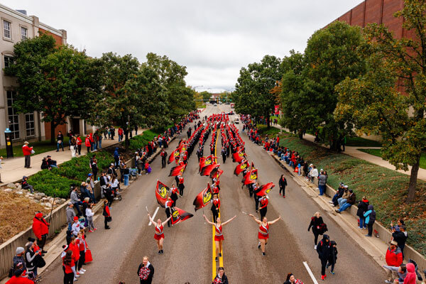 An overhead shot of Big Red Marching Machine in the Homecoming parade.